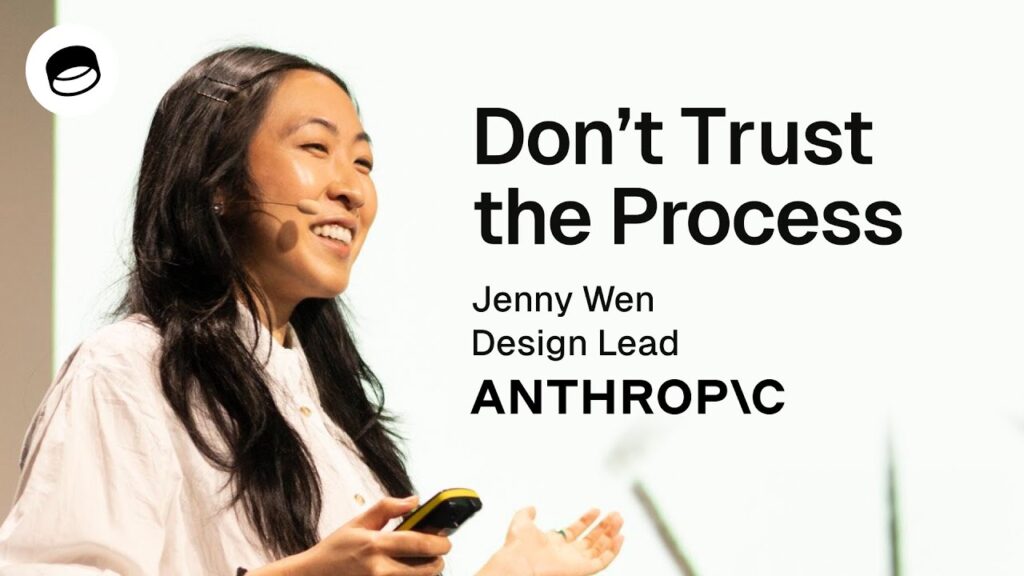 Smiling person with long hair and headset speaking, holding a remote. Text reads 'Don't Trust the Process, Jenny Wen, Design Lead at Anthropic'